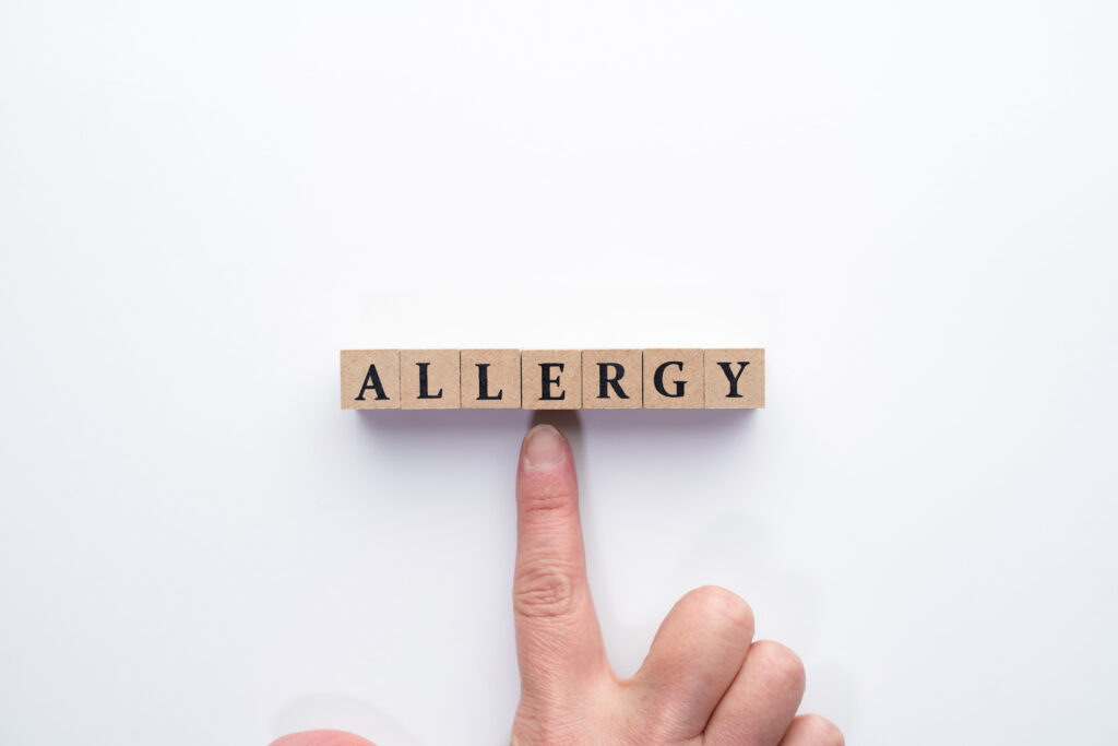 アレルギーの文字を指指す