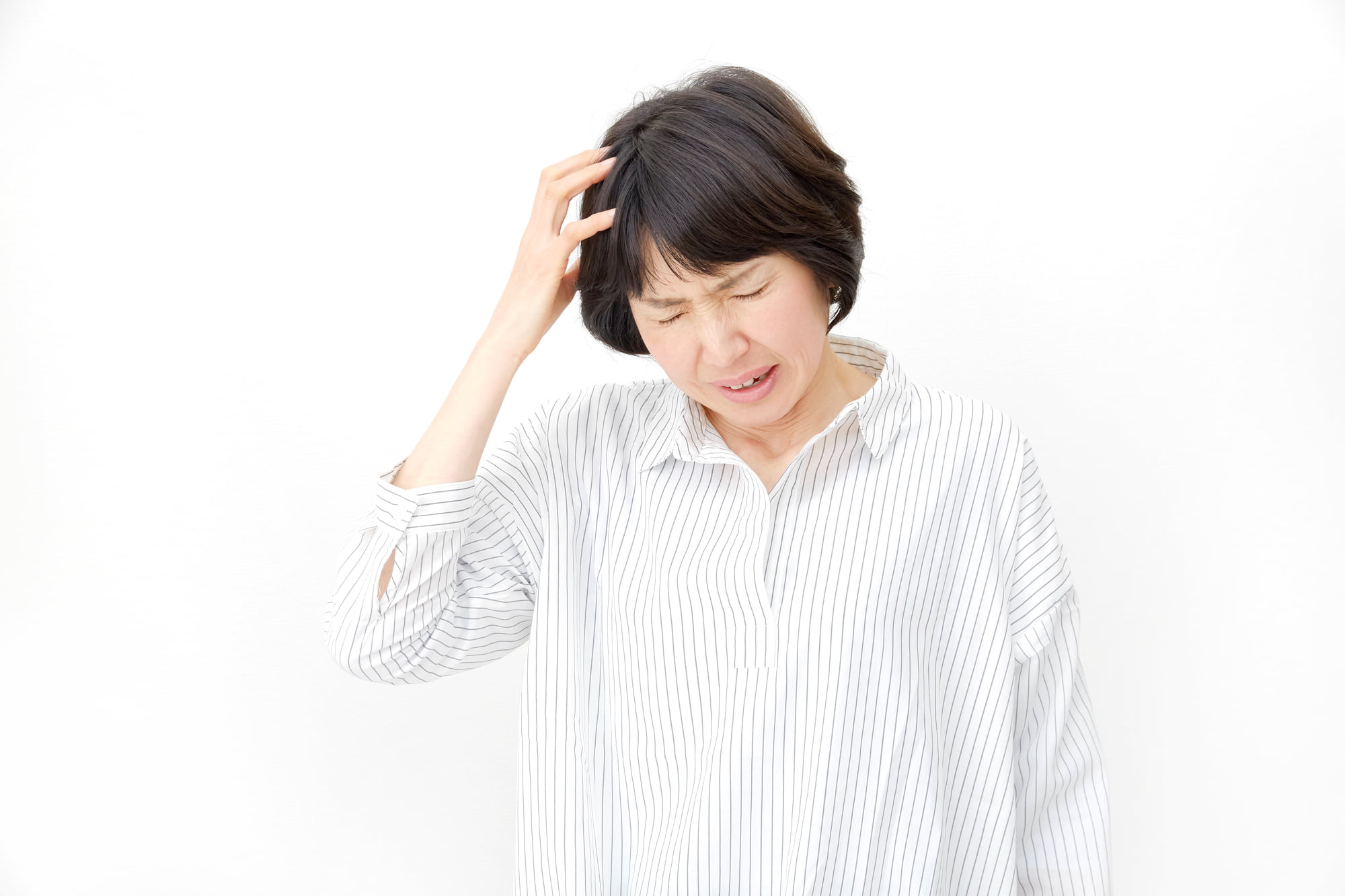 歯を失って後悔する女性